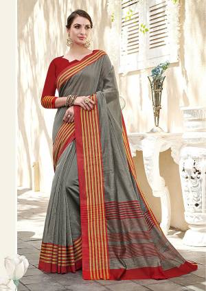 For Your Casual Or Semi-Casual Wear, Grab This Solid Pattern Saree In Grey Color Paired With Contrasting Red Colored Blouse. This Saree and Blouse Are Fabricated On Cotton Which Is Suitable For Daily Wear. Buy This Pretty Simple Saree Now.