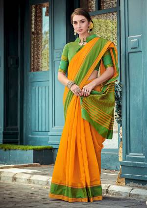 Grab This Pretty Simple And Elegant Looking Plain Saree In Musturd Yellow Color Paired With Green Colored Blouse. This Saree And Blouse Are Cotton Based Which Is Durable, Light Weight And Easy To Care For. 