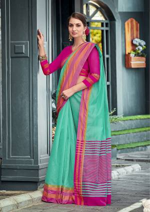 Here Is Beautiful And Elegant Looking Sea Green Colored Plain Saree Paired With Contasting Rani Pink Colored Blouse. This Saree And Blouse Are Fabricated On Cotton, Its Fabric IS Light In Weight And Ensures Superb Comfort All Day Long. 