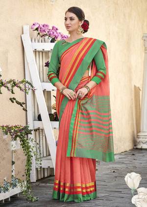 Grab This Pretty Simple And Elegant Looking Plain Saree In Peach Color Paired With Green Colored Blouse. This Saree And Blouse Are Cotton Based Which Is Durable, Light Weight And Easy To Care For. 