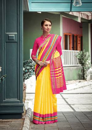 For Your Casual Or Semi-Casual Wear, Grab This Solid Pattern Saree In Yellow Color Paired With Contrasting Dark Pink Colored Blouse. This Saree and Blouse Are Fabricated On Cotton Which Is Suitable For Daily Wear. Buy This Pretty Simple Saree Now.