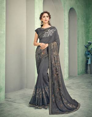 Grey and antique gold makes for an unusually smart combination. This gorgeous saree is apt for any evening or day event. Go conventional with simple drape or try out modern saree drapes, you'll look amazing either way. 