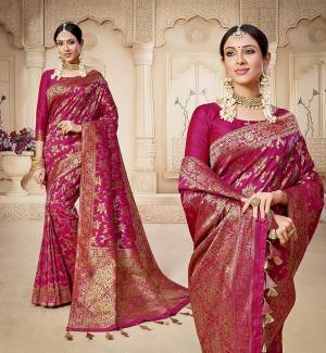 Shine Bright Wearing This Rich Silk Based Designer Saree In Dark Pink Color. This Saree Is Fabricated On Banarasi Silk Paired With Art Silk Fabricated Blouse. It Is Beautified With Heavy Detailed Weaved Giving An Attractive Look .
