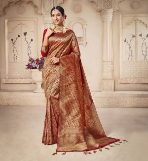 For A Proper Traditional Look, Grab This Pretty Designer Saree In Red Color. This Saree Is Banarasi Silk Based Beautified With Detailed Attractive Weave Paired With Art Silk Fabricated Blouse. Buy Now.