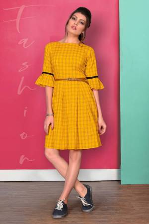 Here Is A Pretty Tunic Patterned Kurti In Yellow Color. This Readymade Kurti Is Fabricated On Cotton Beautified With Checks Prints. Its Fabric Is Light Weight And Easy To Carry All Day Long. 