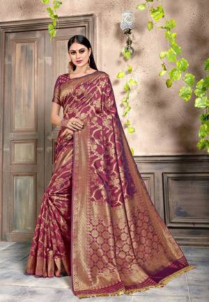 For A Proper Traditonal Look, Grab This Very Beautiful Designer Saree In Magenta Pink Color. This Saree Is Fabricated On Weaving Silk Paired With Art Silk Fabricated Blouse. Its Color and Rich Fabric Will Give An Attractive Look To Your Personality. 