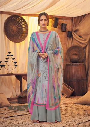 Here Is A Very Pretty And Trendy Straight suit In Grey Color. Its Top And Bottom Are Fabricated On Wool Pashmina Paired With Chiffon Based Dupatta, This Pretty Suit Is Suitable For The Upcoming Winters, Buy Now.