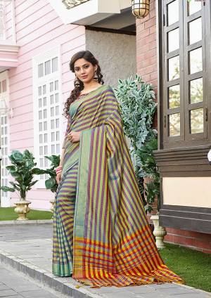 Go Colorful With This Pretty Lining Printed Saree. This Saree Is Fabricated on Cotton Silk Paired With Art Silk Fabricated Blouse. Its Fabric Is Light Weight , Durable And Gives A Rich Look To Your Personality. 