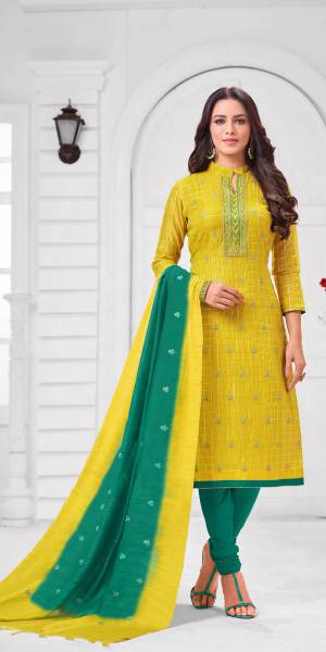 Add This Pretty Suit To Your Wardrobe In Yellow colored Top Paired With Contrasting Pine Green Colored Bottom and Dupatta. Its Top Is Fabricated On Modal Silk Paired With Cotton Bottom and Dupatta. 