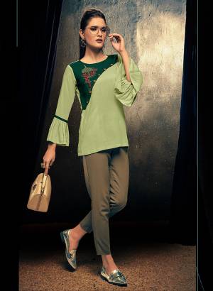 Here Is A Very Pretty Readymade Fancy Top In Green Color For Your College, Outing Or Work Place. This Top Is Fabricated On Rayon Beautified With Thread Work And Can Be Paired With Pants, Denim Or Skirt. 