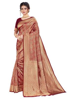 Celebrate This Festive Season With Beauty And Comfort Wearing This Designer Silk Based Saree In Maroon Color. This Saree And Blouse Are Fabricated on Art Silk Beautified With Heavy Weave. 