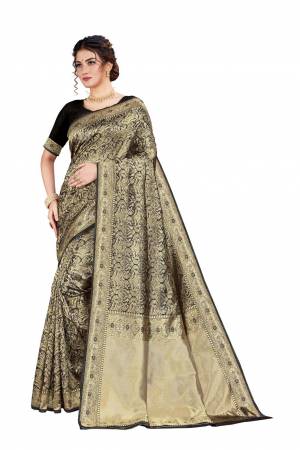 Here Is An Attractive Looking Heavy Weaved Designer Saree In Black Color. This Saree and Blouse Are Fabricated On Art Silk Beautified With Detailed Weave. Buy Now.