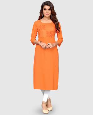 Here Is A Simple And Elegant Looking Readymade Kurti In Orange Color Fabricated On Rayon. This Kurti Is Light In Weight And Can Be Paired With Same Or Contrasting Colored Bottom.