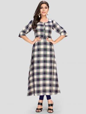 Grab This Readymade Kurti In Black And White Color For Your Casual Or Semi-Casual Which Is Fabricated On Rayon. This Kurti Is Light In Weight And Also Its Fabric Ensures Superb And Its Easy To Care For. 