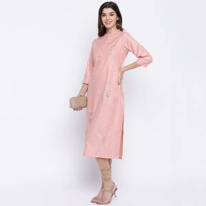 Grab This Readymade Kurti In Light Peach Color For Your Casual Or Semi-Casual Which Is Fabricated On Cotton. This Kurti Is Light In Weight And Also Its Fabric Ensures Superb And Its Easy To Care For. 