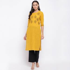 Add This Pretty Simple Kurti To Your Wardrobe In Musturd Yellow color Fabricated On Cotton Slub. This Readymade Kurti Is Suitable For Daily Or Office Wear. 