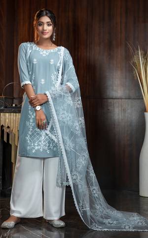 Grab This Very Pretty And Elegant Looking Designer Suit In Baby Blue Color Paired With White Colored Bottom and Baby Blue Colored Dupatta. Its Embroidered Top Is Georgette Based Paired With Rayon Bottom And Net Fabricated Embroidered Dupatta. 