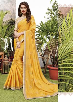 Celebrate This Festive Season With Beauty And Comfort Wearing This Designer Embroidered Saree In Yellow Color. This Saree Is Fabricated On Chiffon Paired With Art Silk Fabricated Blouse. 