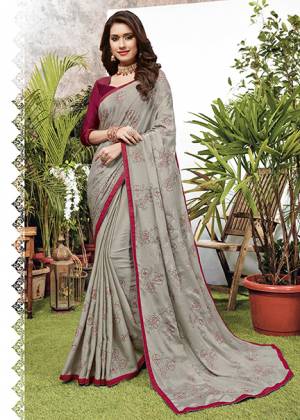 Celebrate This Festive Season With Beauty And Comfort Wearing This Designer Embroidered Saree In Grey Color. This Saree Is Fabricated On Chiffon Paired With Art Silk Fabricated Blouse. 
