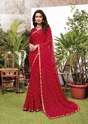 Look Pretty Wearing This Elegant Looking Designer Saree In Red Color. This Pretty Saree Is Fabricated On Georgette Paired With Art Silk Fabricated Blouse. It Is Light In Weight And Easy To Carry All Day Long. 