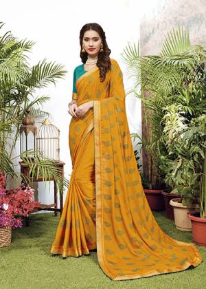Celebrate This Festive Season With Beauty And Comfort Wearing This Designer Embroidered Saree In Musturd Yellow Color. This Saree Is Fabricated On Chiffon Paired With Art Silk Fabricated Blouse. 