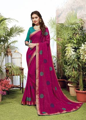Look Pretty Wearing This Elegant Looking Designer Saree In Dark Pink Color. This Pretty Saree Is Fabricated On Georgette Paired With Art Silk Fabricated Blouse. It Is Light In Weight And Easy To Carry All Day Long. 