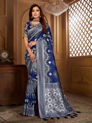 Celebrate This Festive Wearing This Designer Saree In Navy Blue Color Paired With Navy Blue Colored Blouse. This Saree Is Fabricated On Jacquard Silk Paired With Art Silk Fabricated Blouse. Its Saree Is Beautified With Weave Paired With Embroidered Blouse. 