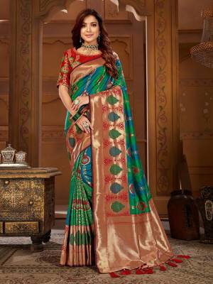 Celebrate This Festive Wearing This Designer Saree In Multi Color Paired With Red Colored Blouse. This Saree Is Fabricated On Jacquard Silk Paired With Art Silk Fabricated Blouse. Its Saree Is Beautified With Weave Paired With Embroidered Blouse. 