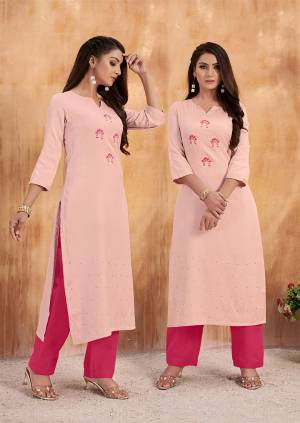 Look Pretty Wearing This Pretty Pair Of Readymade Kurti In Baby Pink colored Top Paired With Dark Pink Colored Bottom. This Pair Is Cotton Based Which Is Suitable For The Summer. 