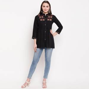 For your Semi Casual Wear, Grab This Simple Readymade Top In Black Fabricated On Rayon. This Top Is Best Suited With Denims And It Is Light In Weight And Easy To Carry All Day Long. 