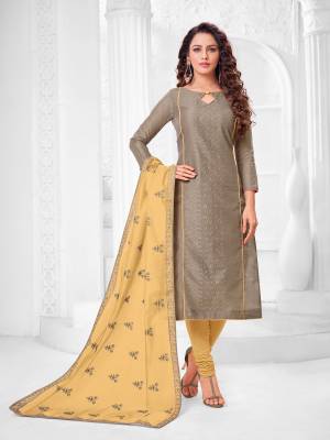 Grab This Designer Straight Suit For Your Semi-Casual Wear In Brown Color Paired With Yellow Colored Bottom and Dupatta. Its Top and Dupatta Are Modal Silk Based Paired With Cotton Bottom.