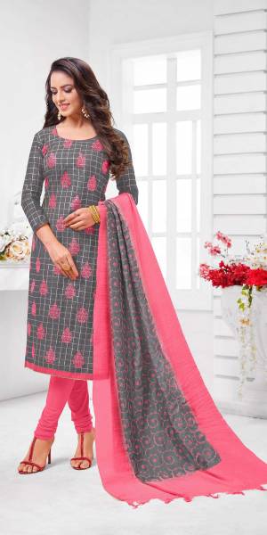 Add This Pretty Suit To Your Wardrobe In Grey colored Top Paired With Contrasting Pink Colored Bottom and Dupatta. Its Top Is Fabricated On Modal Checks Paired With Cotton Bottom and Dupatta.