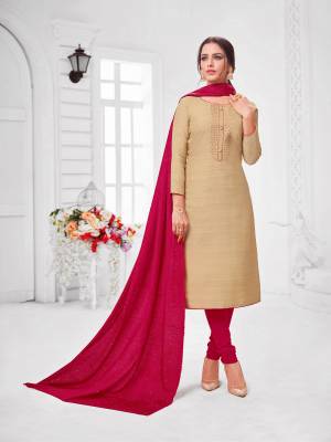 You Will Definitely Earn Lots Of Compliments Wearing This Designer Straight Suit In Beige Colored Top Paired With Maroon Colored Bottom And Dupatta. Its Top Is Fancy Fabric Based Paired With Cotton Bottom and Soft SilkFabricated Dupatta
