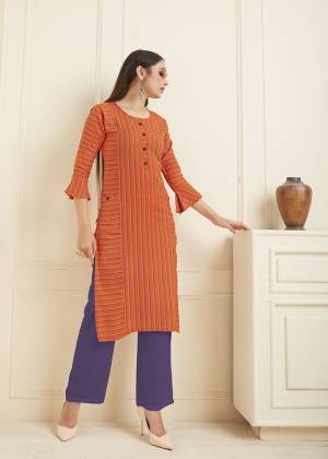 Here Is A Printed Readymade Straight Cut Kurti For Your Casual Or Semi-Casual Wear In Orange Color. This Lining Printed Kurti Is Fabricated On Cotton And Can Be Paired With Same Or Contrasting Colored Leggings, Pants Or Plazzo. Buy now.