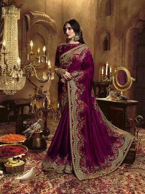 Get Ready For The Upcoming Wedding Season With Heavy Designer Saree In Purple Color Paired With Purple Colored Blouse. This Saree Is Fabricated On Satin Silk Paired With Art Silk Fabricated Blouse. It Is Beautified With Heayv Detailed Embroidery Giving An Attractive Look. 
