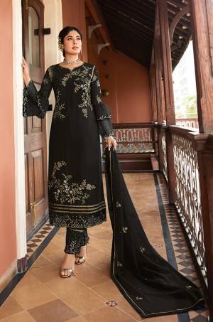 This Festive And Wedding Season, Be The Most Beautiful Diva Wearing This Designer Straight Suit In Black Color. Its Embroidered Top Is Fabricated on Satin Georgette Paired With Santoon Bottom And Chiffon Dupatta. Buy Now.