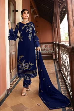 Flaunt Your Rich And Elegant Taste Wearing This Designer Straight Suit In Royal Blue Color. Its Pretty Top Is Fabricated On Satin Georgette Paired With Santoon Bottom And Chiffon Fabricated Dupatta. Its Top, Bottom And Dupatta Are Beautified With Detailed Embroidery Which Gives An Elegant Look. 