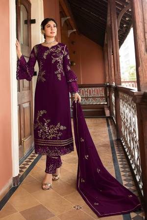 This Festive And Wedding Season, Be The Most Beautiful Diva Wearing This Designer Straight Suit In Purple Color. Its Embroidered Top Is Fabricated on Satin Georgette Paired With Santoon Bottom And Chiffon Dupatta. Buy Now.
