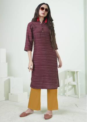 Here Is A Pretty Simple Lining Printed Readymade Kurti In Maroon Color. This Pretty Kurti Is Fabricated On Cotton And It Can Be Paired With Pants, Plazzo Or Leggings. Also It Is Available In All Regular Sizes. Buy Now.