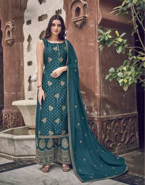 Look Pretty In This Blue colored Designer Straight suit. Its Embroidered Top Is Jacquard Silk Based Paired With Art Silk Bottom and Chiffon Fabricated Dupatta. Buy Now.
