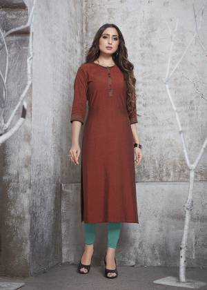 Simple And Elegant Looking Straight Kurti Is Here In Brown Color Fabricated On Rayon. This Plain Kurti Is Readymade And Available In All Regular Sizes. 