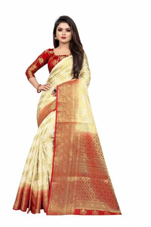 Grab This Beautiful Designer Weaved Saree In Cream color Paired With Red Colored Blouse. This Saree And Blouse Are Fabricated On Art Silk Which Also Gives A Rich Look To Your Personality. 