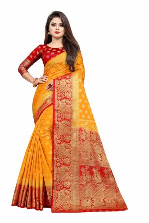 Celebrate This Festive Season In A Proper Traditonal Look Wearing This Silk Based Saree In Musturd Yellow Color Paired With Red Colored Blouse. This Saree And Blouse Are Fabricated On Art Silk Beautified with Weave. 
