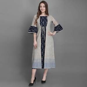 Grab This Pretty Readymade Kurti In Navy Blue Color Fabricated On Cotton Paired With A Cream Colored Jacket Fabricated On Cotton. Buy This Pair Of Kurti With Jacket Now.