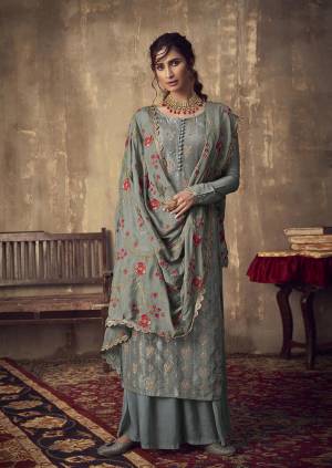 Add This Very Pretty Designer Straight Suit In Grey Color. Its Top Is Fabricated On Jacquard Silk Paired With Santoon Bottom Paired With Chinon Chiffon Fabricated Dupatta. Its Rich Fabric And Color will Earn You Lots Of Compliments From Onlookers. 
