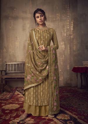 Add This Very Pretty Designer Straight Suit In Olive Brown Color. Its Top Is Fabricated On Jacquard Silk Paired With Santoon Bottom Paired With Chinon Chiffon Fabricated Dupatta. Its Rich Fabric And Color will Earn You Lots Of Compliments From Onlookers. 