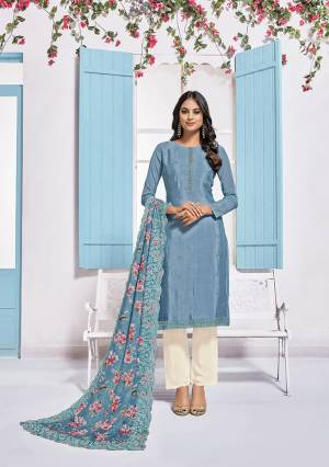 Grab This Very Pretty Designer Straight Suit In Blue Colored Top Paired With White Colored Bottom And Blue Colored Dupatta. Its Top Is Fabricated On Chinon Paired With Crepe Bottom And Chiffon Fabricated Dupatta. Its Pretty Floral Prints And Tone To Tone Embroidery Gives An Elegant Look To Your Personality. 