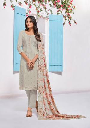 You Will Definitely Earn Lots Of Compliments Wearing This Designer Straight Suit In Light Grey Color. Its Top Is Chinon Based Beautified With Tone To Tone Embroidery Paired With Santoon Bottom And Chiffon Fabricated Dupatta Beautified With Floral Prints And Thread Work. 