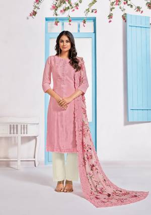 Grab This Very Pretty Designer Straight Suit In Pink Colored Top Paired With White Colored Bottom And Pink Colored Dupatta. Its Top Is Fabricated On Chinon Paired With Crepe Bottom And Chiffon Fabricated Dupatta. Its Pretty Floral Prints And Tone To Tone Embroidery Gives An Elegant Look To Your Personality. 