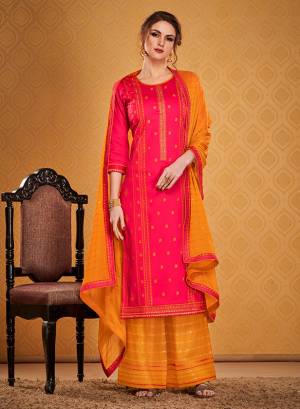 Get Ready For The Upcoming Wedding And Festive Season Wearing This Designer Straight Suit In Rani Pink Color Paired With Contrasting Musturd Yellow Colored bottom And Dupatta. Its Top Is Fabricated On Cotton Silk Paired With Rayon Silk bottom and Chinon Dupatta. Buy This Pretty Embroidered Suit Now.